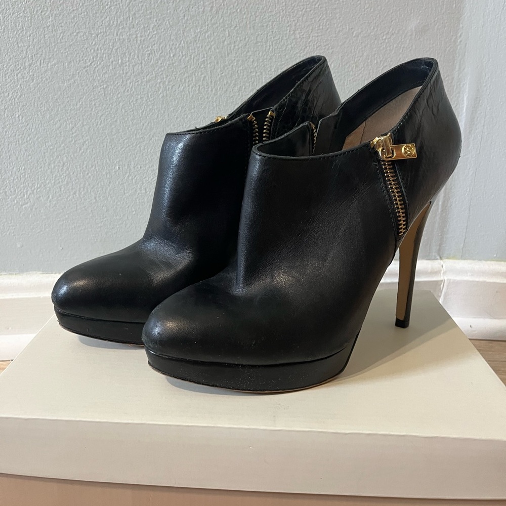 Michael Kors black heeled zip up booties
